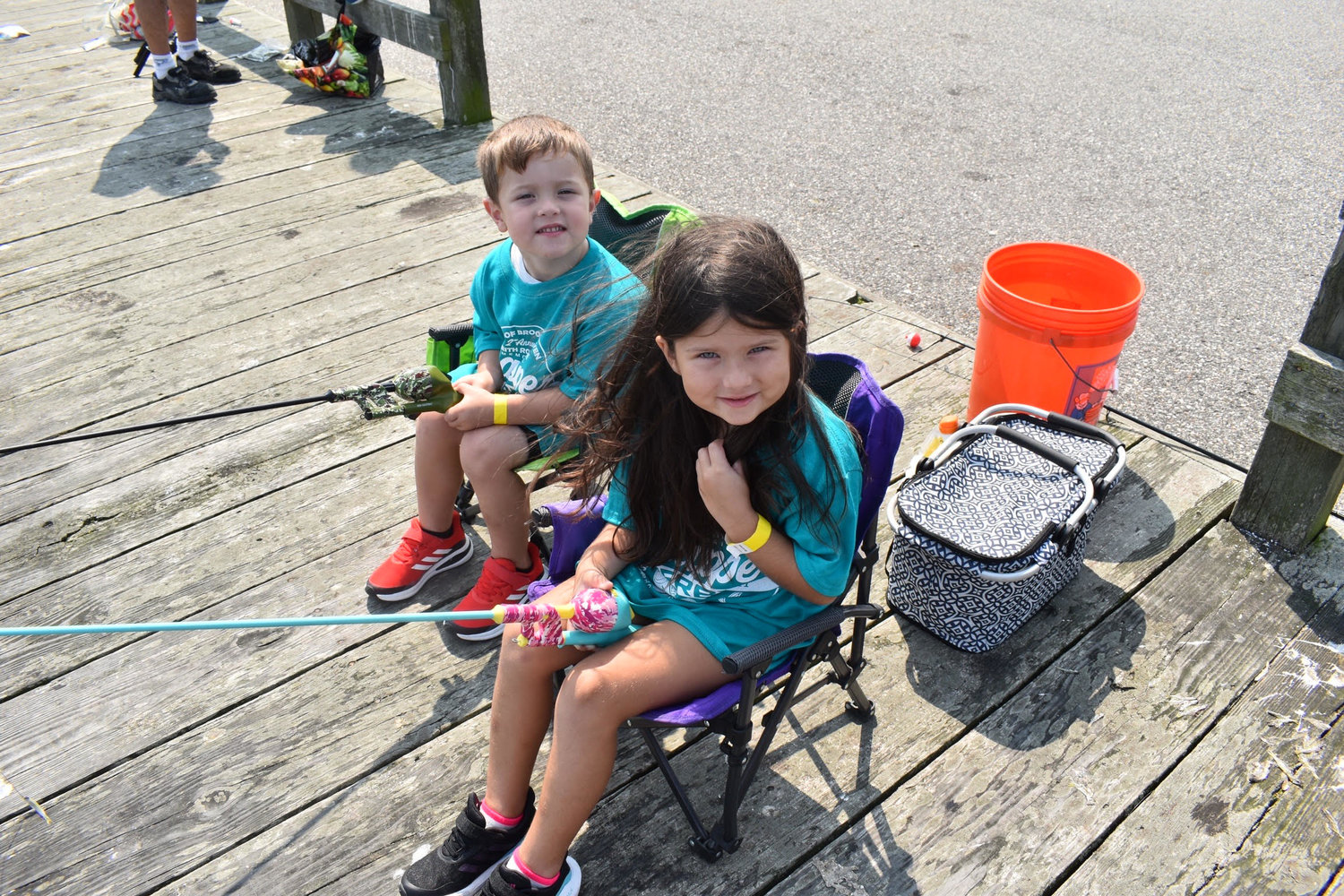 Pictured are Nova and Jack Hughes. All participants received a T-shirt and fishing pole.